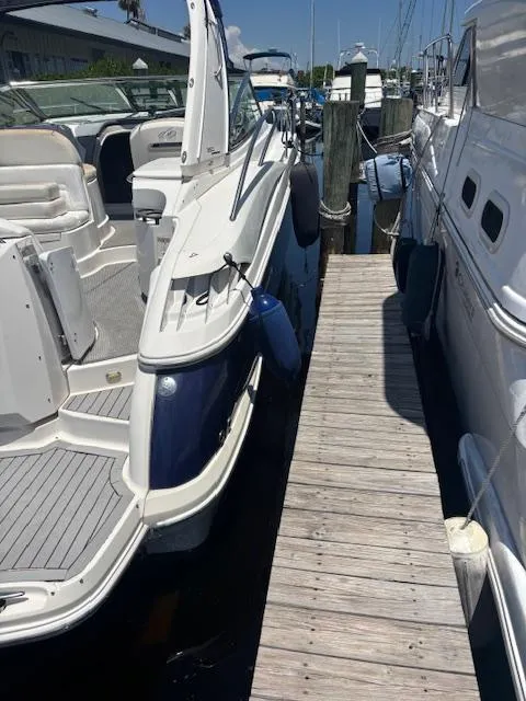 Slide: The Image of 2007 Monterey 350 Sport Yacht docked beside wooden pier in marina. - 10