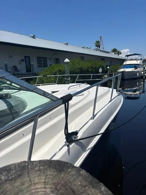 Slide: The Image of 2007 Monterey 350 Sport Yacht docked at marina under clear blue sky. - 12