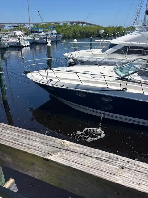 Slide: The Image of 2007 Monterey 350 Sport Yacht docked in a marina with other boats. - 2