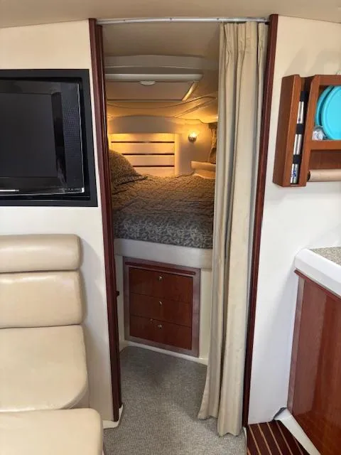 Slide: The Image of Interior of 2007 Monterey 350 Sport Yacht with cozy bedroom and modern amenities. - 22