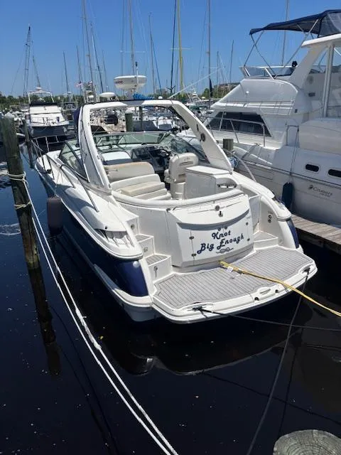Slide: The Image of 2007 Monterey 350 Sport Yacht docked at marina, sunny day, rear view. - 7