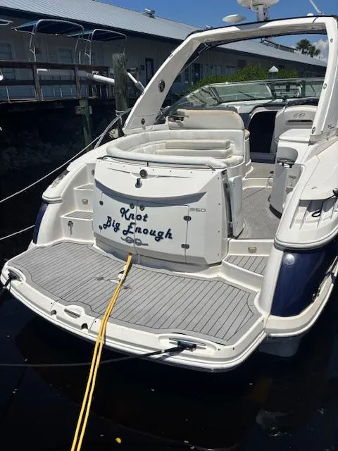 Slide: The Image of 2007 Monterey 350 Sport Yacht docked, rear view with "Knot Big Enough" text. - 8