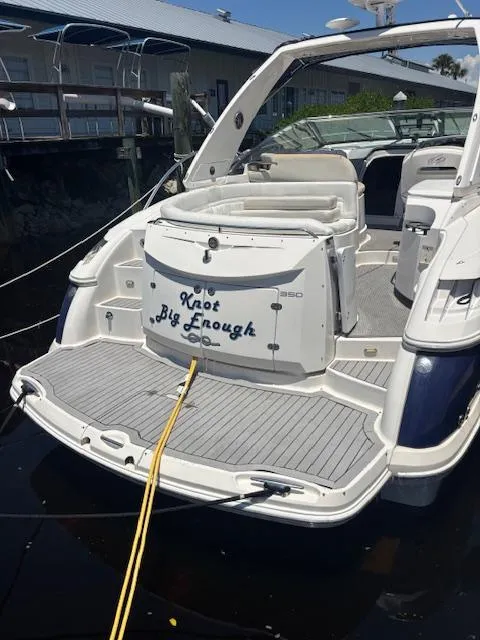 Slide: The Image of 2007 Monterey 350 Sport Yacht docked, rear view with "Knot Big Enough" text. - 9