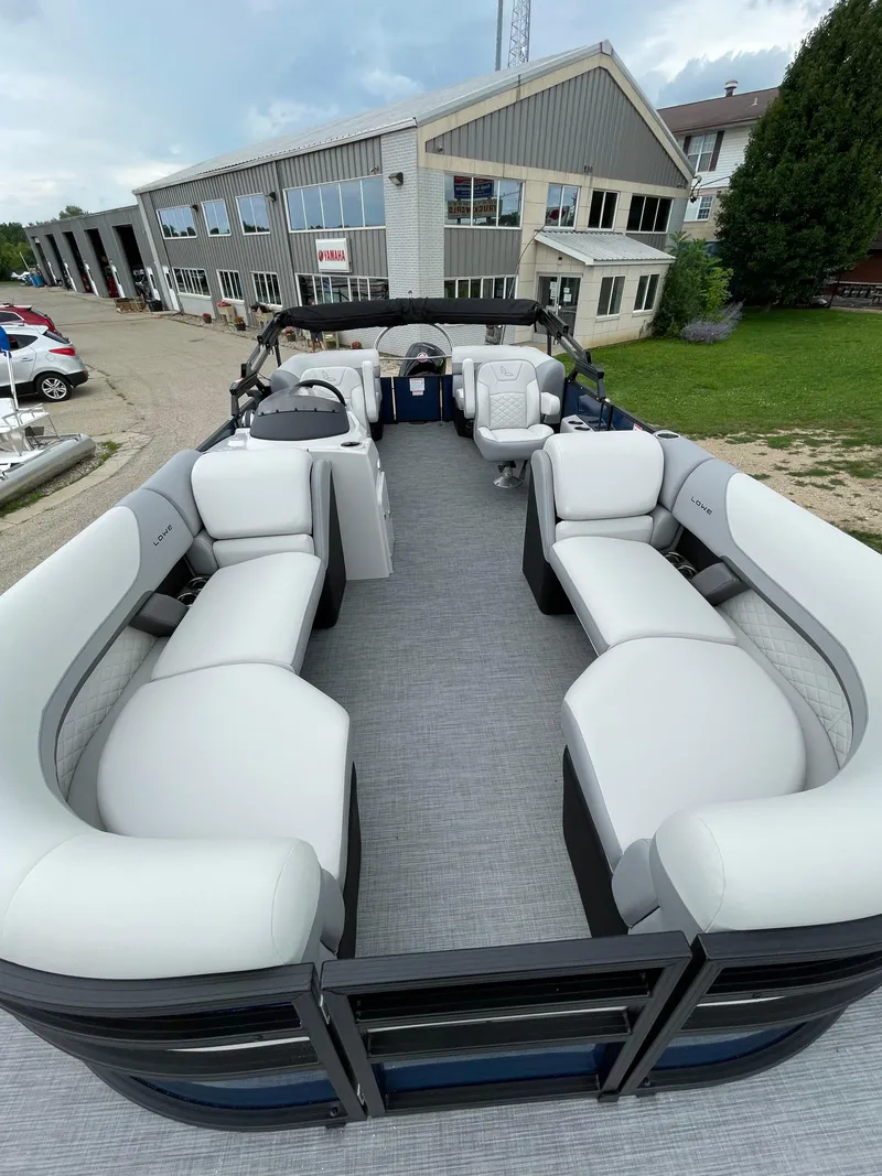 Slide: The Image of 2026 Lowe SS 230 WT Special pontoon boat with spacious seating and modern design. - 5
