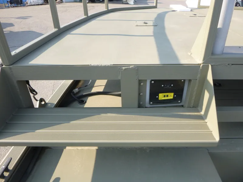 Slide: The Image of 2024 Tracker Grizzly 2072 CC Sportsman boat interior, showcasing seating and control panel. - 8