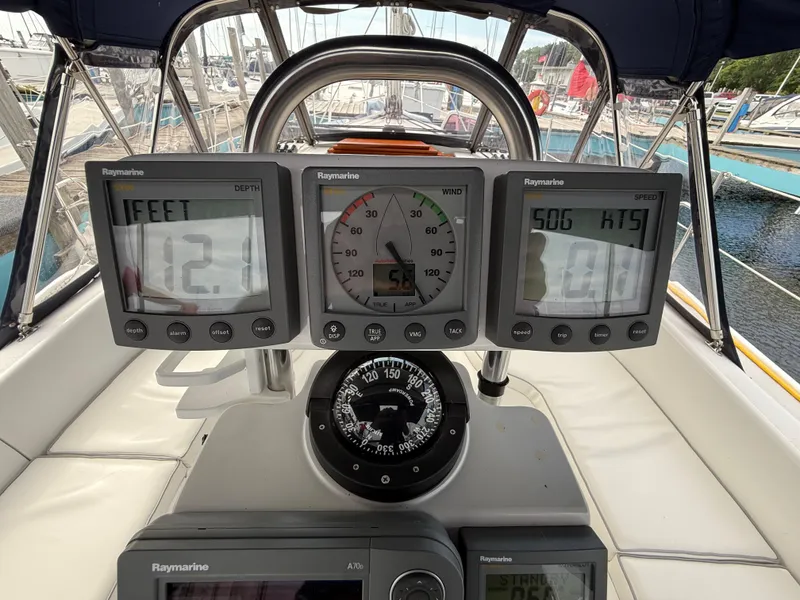Slide: The Image of Cockpit of 2007 Catalina 309 sailboat with Raymarine navigation instruments. - 19