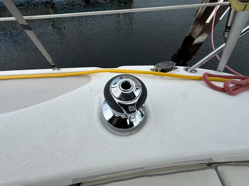 Slide: The Image of Catalina 309 sailboat deck with winch, ropes, and water view, 2007 model. - 26