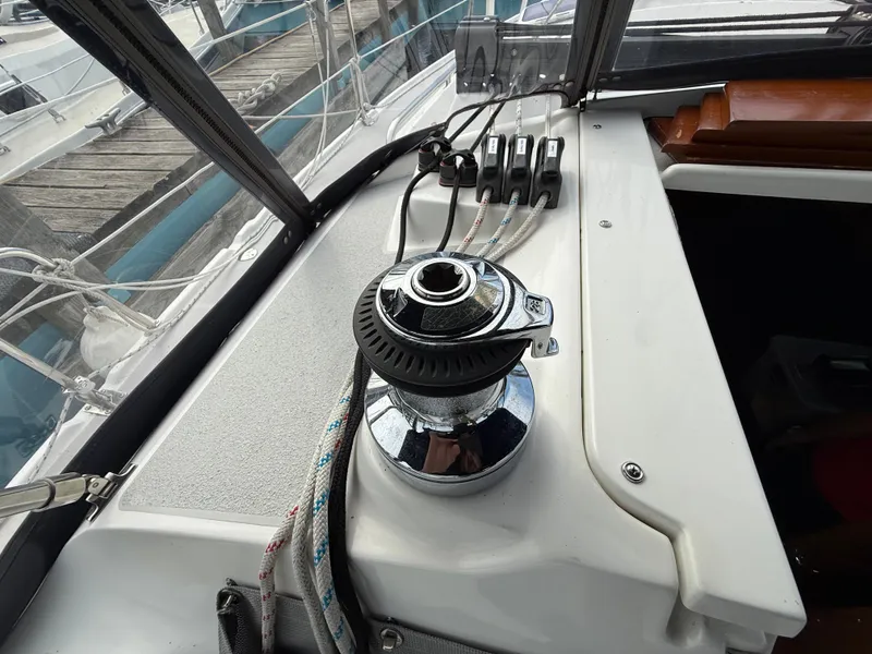 Slide: The Image of Cockpit of 2007 Catalina 309 sailboat with winch and control lines. - 28