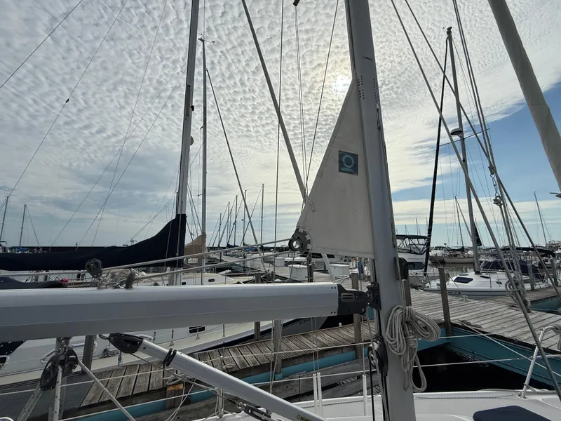 Slide: The Image of Sailboat in marina, Catalina 309, 2007 model, under cloudy sky. - 31