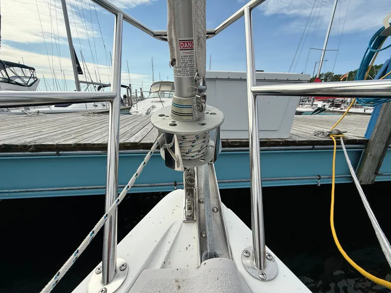 Slide: The Image of Bow of 2007 Catalina 309 sailboat docked, showing rigging and deck details. - 33