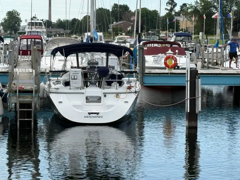 Slide: The Image of Catalina 309 sailboat docked at marina, 2007 model, named Menominee. - 4