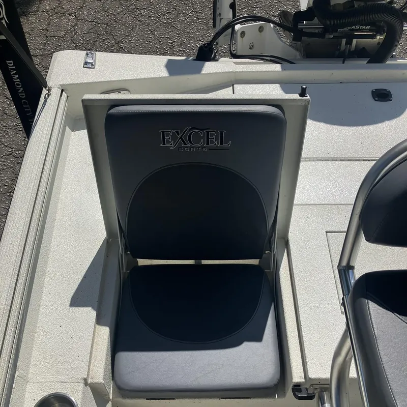 Slide: The Image of 2022 Excel 220 Bay Pro boat seat with logo, featuring sleek design and comfortable padding. - 16
