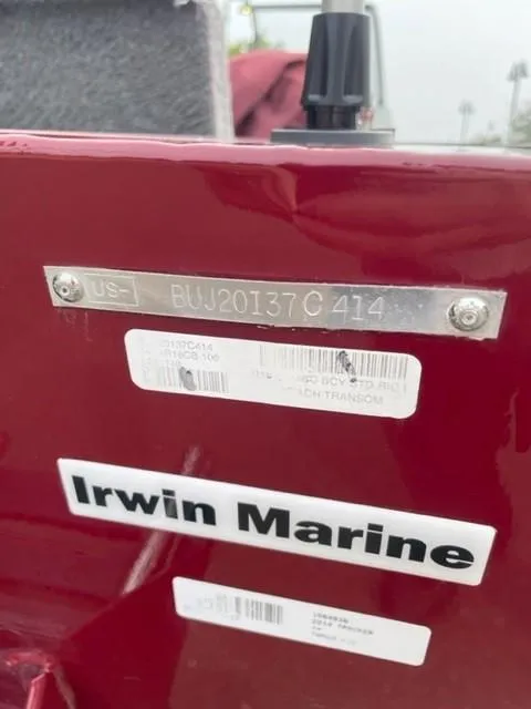 Slide: The Image of 2014 Tracker Targa V-18 Combo boat with identification plate and Irwin Marine label. - 16