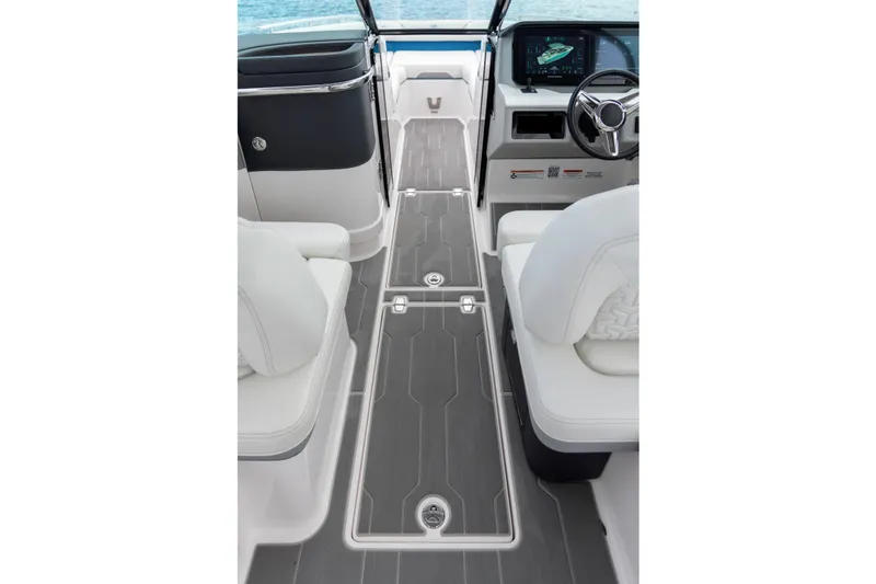 Slide: The Image of 2026 Regal LS9 Surf boat interior with sleek design and modern dashboard. - 16