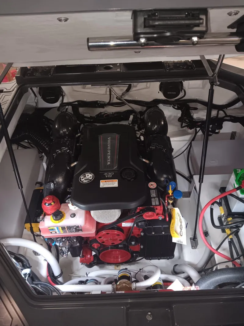 Slide: The Image of Engine compartment of 2026 Cobalt R4 Surf boat, featuring Volvo Penta V8 engine. - 10