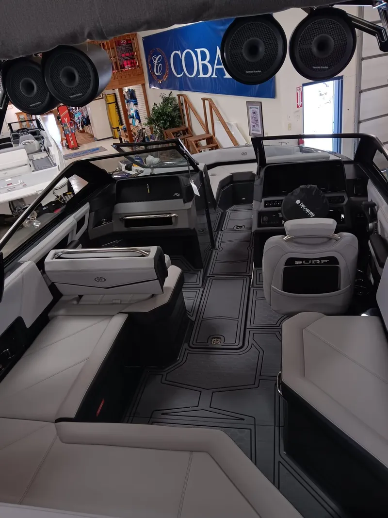 Slide: The Image of 2026 Cobalt R4 Surf boat interior with modern seating and advanced audio system. - 12