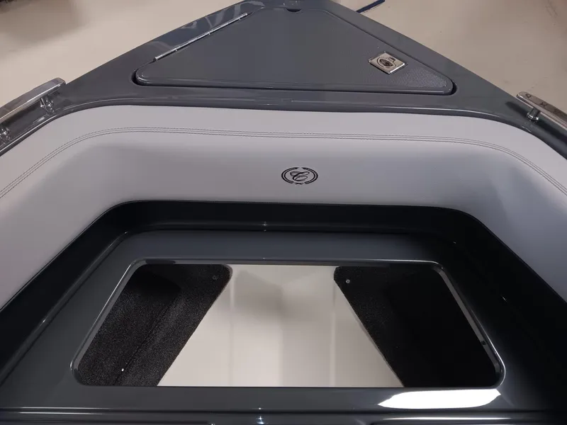 Slide: The Image of 2026 Cobalt R4 Surf boat interior with sleek seating and storage compartment. - 6