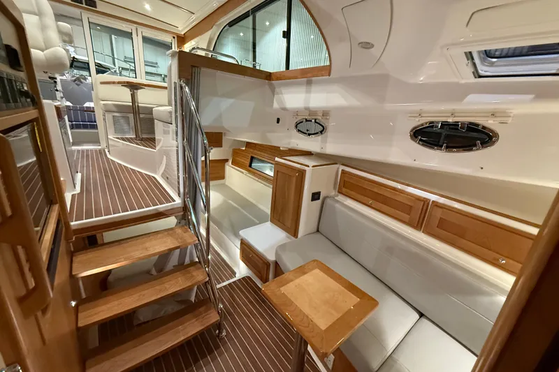 Slide: The Image of Luxurious interior of 2026 Back Cove 39O yacht with wood accents and modern design. - 29
