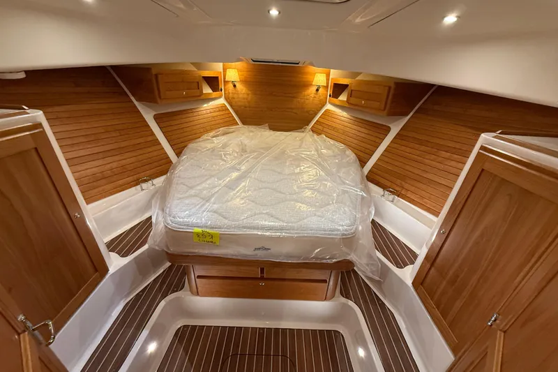 Slide: The Image of Luxurious cabin interior of 2026 Back Cove 39O yacht with wooden finishes and cozy lighting. - 37