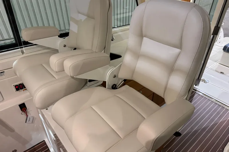 Slide: The Image of 2026 Back Cove 39O boat in a spacious indoor storage facility. - 9