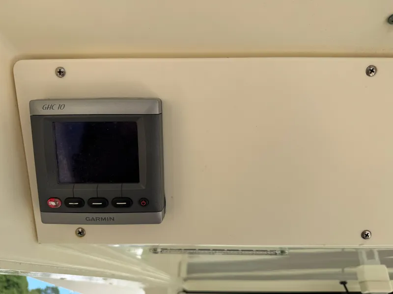 Slide: The Image of Garmin GHC 10 marine display on 2011 Scout 345 XSF boat dashboard. - 21