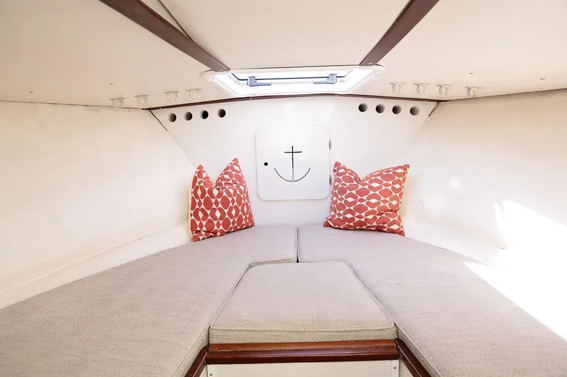 Slide: The Image of 1969 Bertram 31 Classic yacht interior with wooden cabinets and modern appliances. - 8