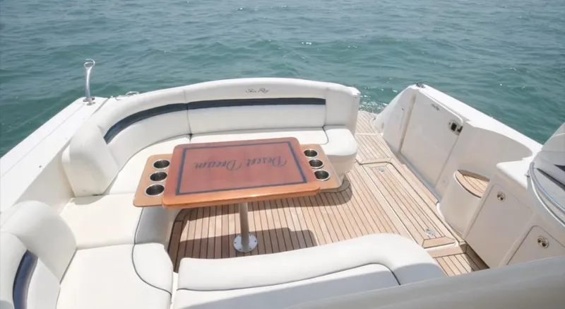 Slide: The Image of 2007 Sea Ray 40 Sundancer yacht with elegant seating and table on deck. - 18