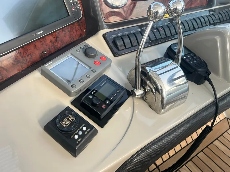 Slide: The Image of Control panel of a 2007 Sea Ray 40 Sundancer boat with navigation equipment. - 21