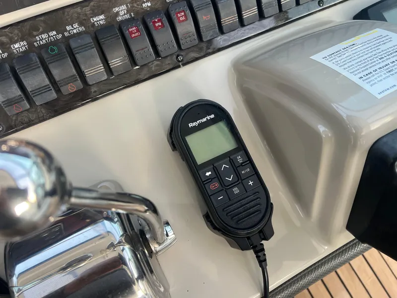 Slide: The Image of Control panel of a 2007 Sea Ray 40 Sundancer with Raymarine remote. - 22