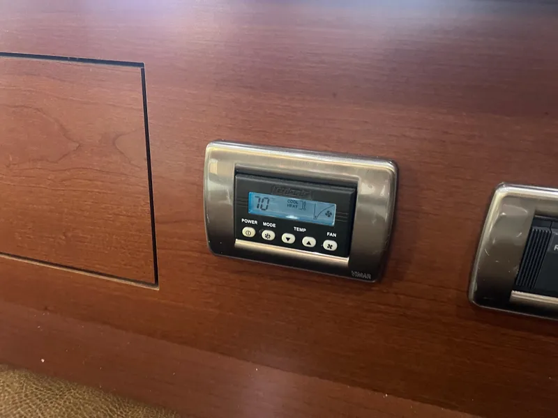 Slide: The Image of Thermostat control panel on 2007 Sea Ray 40 Sundancer yacht interior. - 28