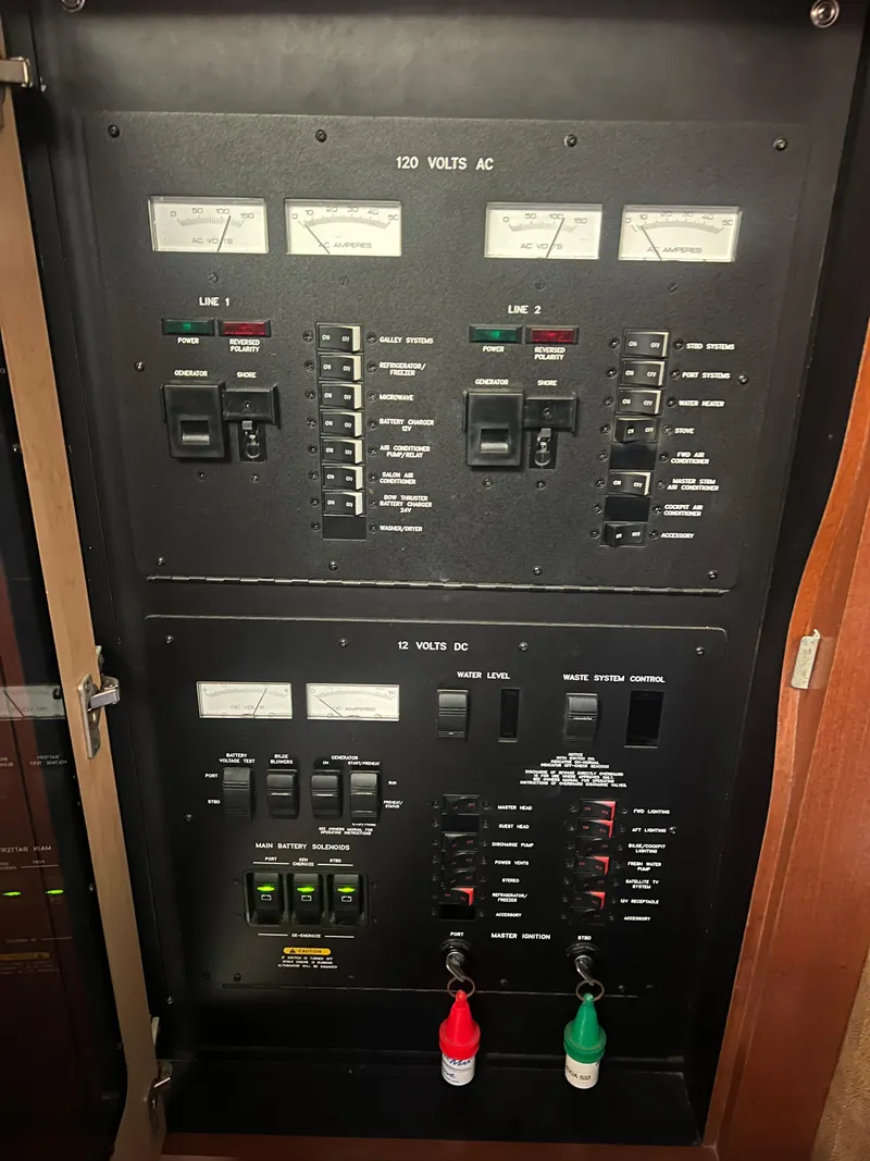 Slide: The Image of Electrical control panel on a 2007 Sea Ray 40 Sundancer boat. - 29
