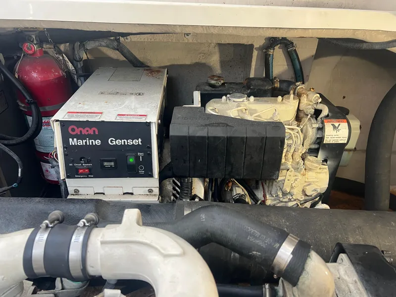 Slide: The Image of Engine compartment of a 2007 Sea Ray 40 Sundancer with Onan Marine Genset. - 40