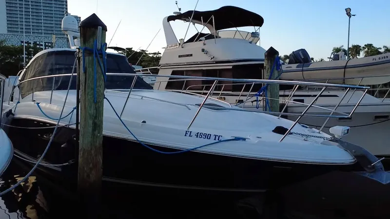 Slide: The Image of 2007 Sea Ray 40 Sundancer yacht docked at marina, side view. - 46
