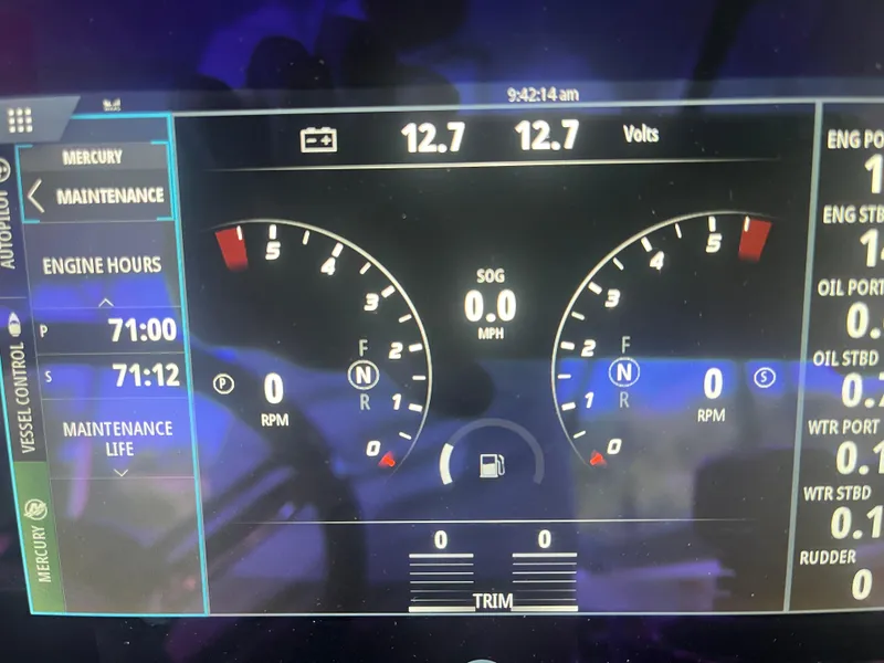 Slide: The Image of Dashboard of 2023 Formula 310 Bowrider I/O showing engine hours and voltage. - 19