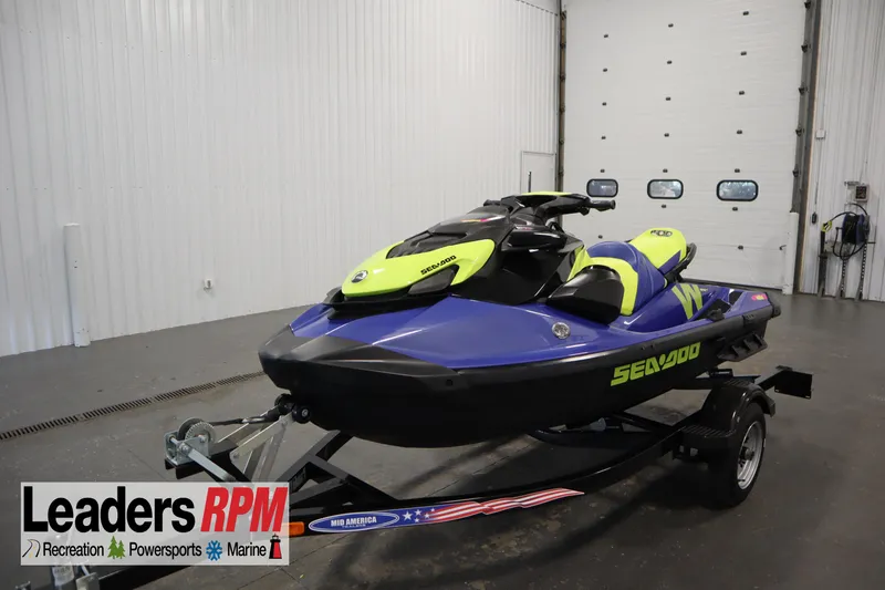 The Image of 2020 Sea-Doo Wake 170 SS jet ski on trailer in indoor showroom. - 1