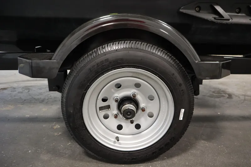 Slide: The Image of Trailer wheel for 2020 Sea-Doo Wake 170 SS, featuring a black tire and white rim. - 29