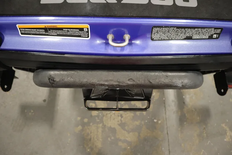 Slide: The Image of 2020 Sea-Doo Wake 170 SS rear view with warning labels and tow hook. - 32