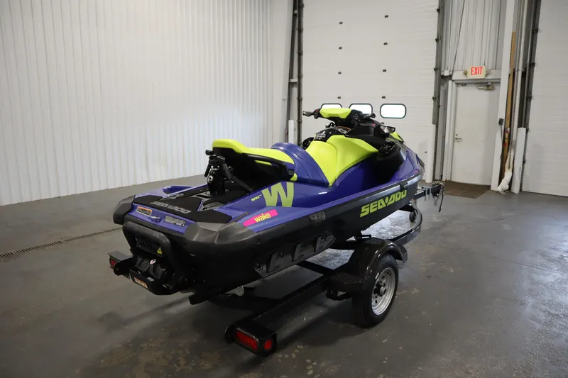 Slide: The Image of 2020 Sea-Doo Wake 170 SS jet ski on trailer in a garage setting. - 5