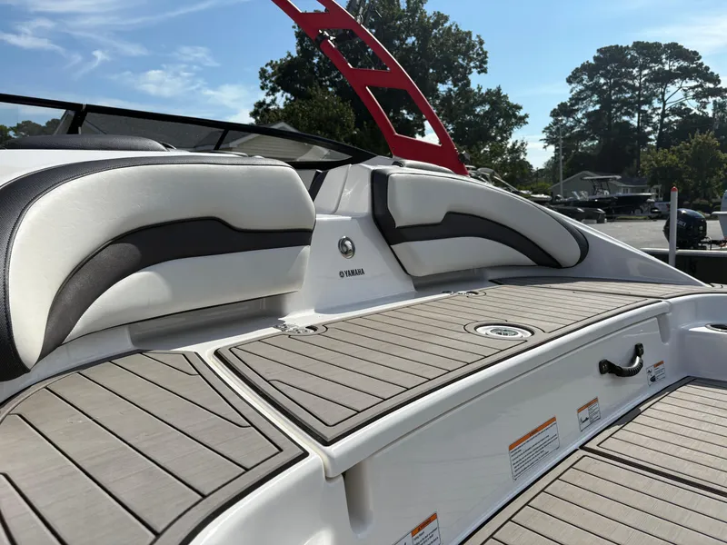 Slide: The Image of 2019 Yamaha AR195 boat interior with sleek seating and modern design. - 14