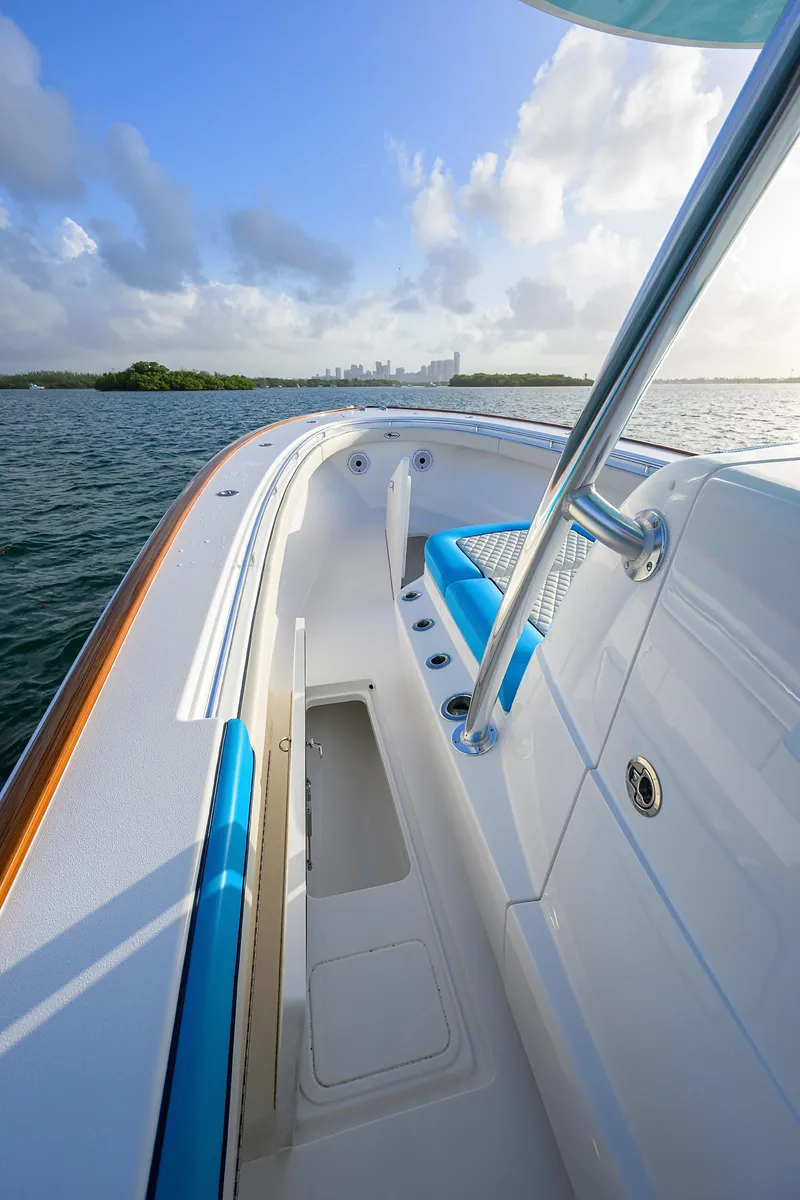 Slide: The Image of 2022 Valhalla Boatworks V-37, sleek deck view, ocean backdrop, clear sky. - 12