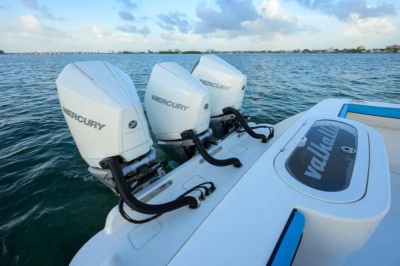 Slide: The Image of 2022 Valhalla V-37 boat with triple Mercury outboard engines on the water. - 25