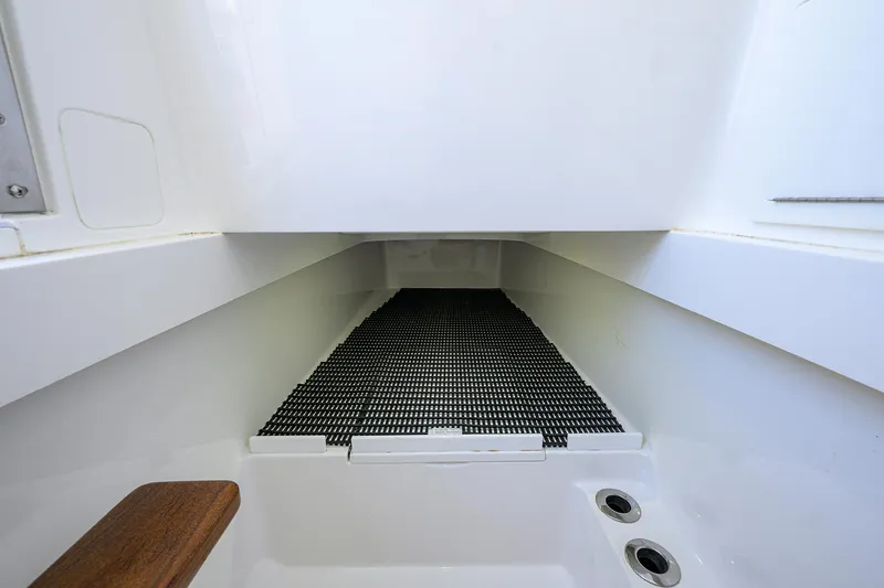 Slide: The Image of 2022 Valhalla Boatworks V-37 interior storage compartment with drainage system. - 28