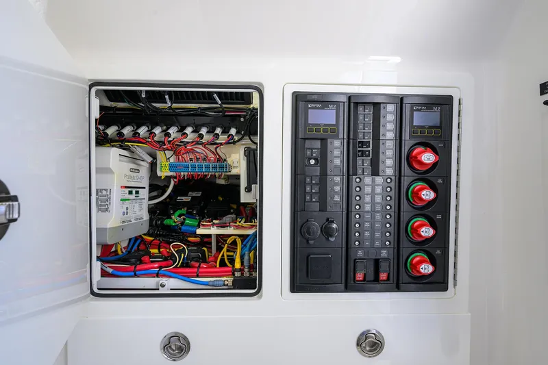 Slide: The Image of Electrical panel of 2022 Valhalla Boatworks V-37, showcasing wiring and control systems. - 31