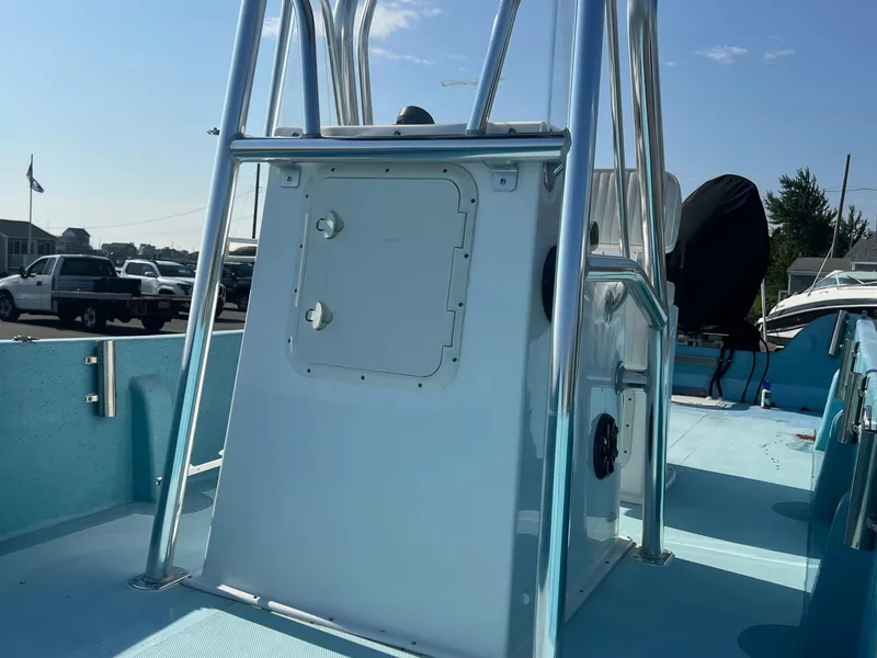 Slide: The Image of 2023 Banks Panga 26 Panga boat interior with console and railing. - 12