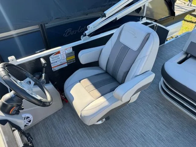Slide: The Image of Captain's chair and steering wheel of 2020 Bennington SX22 pontoon boat. - 15