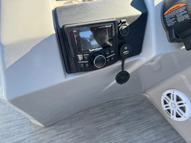 Slide: The Image of Control panel of 2020 Bennington SX22 boat with audio system and USB port. - 17
