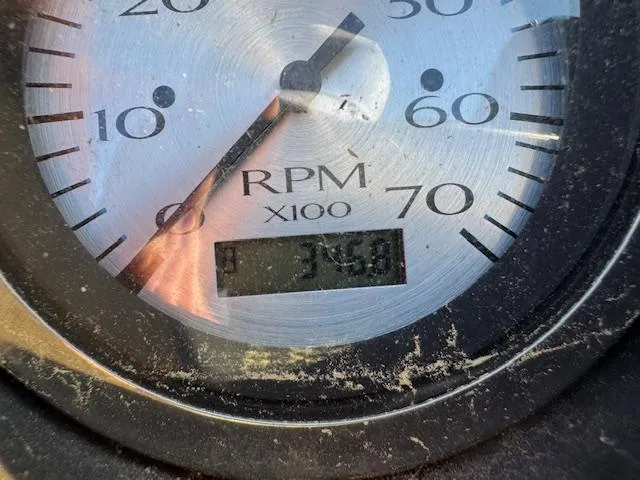 Slide: The Image of Close-up of a Bennington SX22 2020 RPM gauge displaying 345.8 hours. - 18
