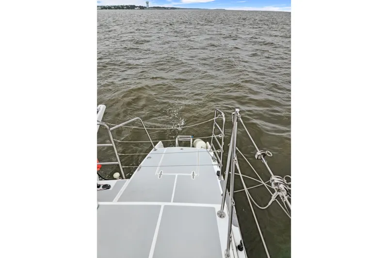 Slide: The Image of 2018 Maine Cat 38 LS sailing on open water, view from deck. - 34