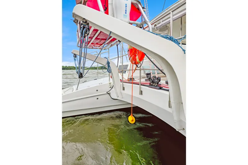 Slide: The Image of 2018 Maine Cat 38 LS catamaran with safety equipment and ropes on deck. - 39
