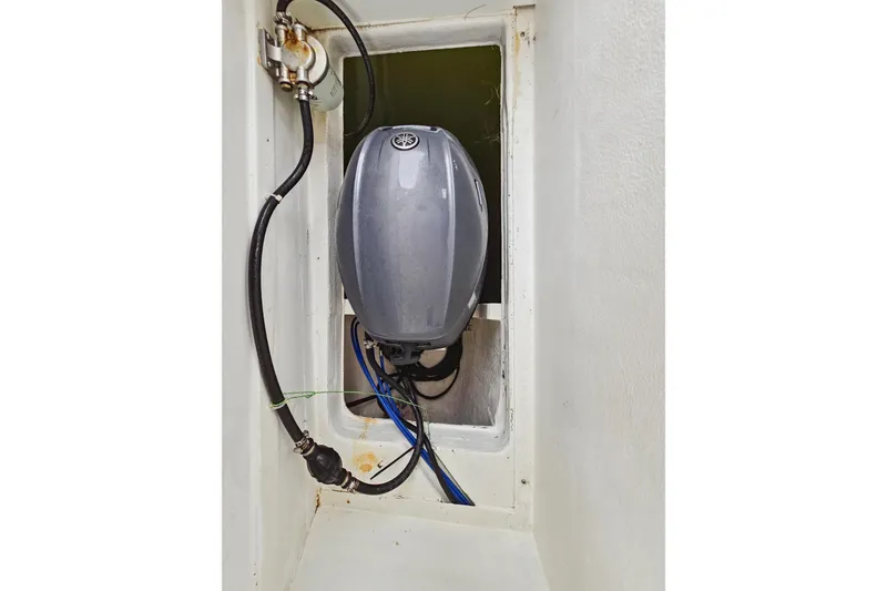 Slide: The Image of Engine compartment of 2018 Maine Cat 38 LS with visible wiring and components. - 80